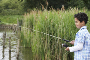 Going fishing on a beautiful spring or summer day is a perfect outdoor nature activity for kids.