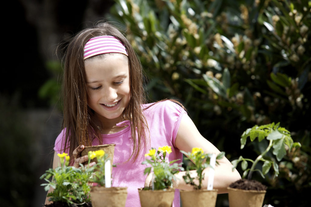 Spring is a great time for kids to plant flowers.
