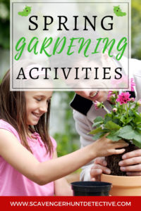 A girl plants a flower in a pot